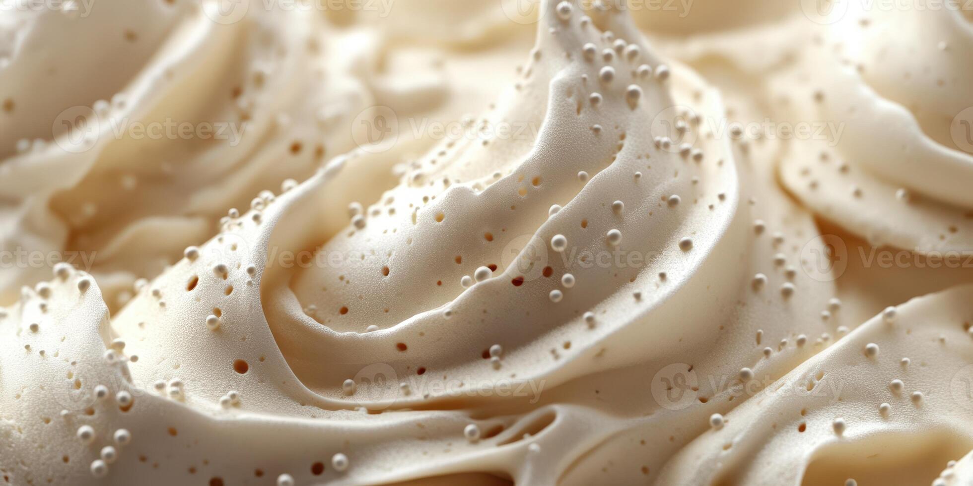 Creamy swirls of gourmet frosting topped with delicate air bubbles create an enticing dessert topping experience photo