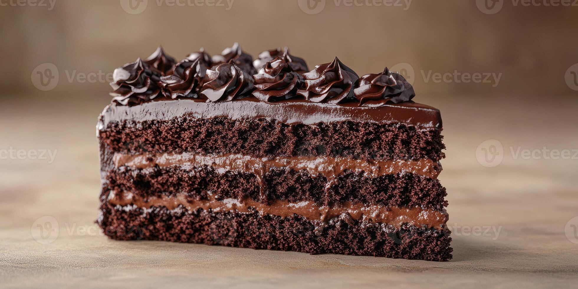 Indulgent chocolate cake with rich frosting displayed on a rustic surface photo