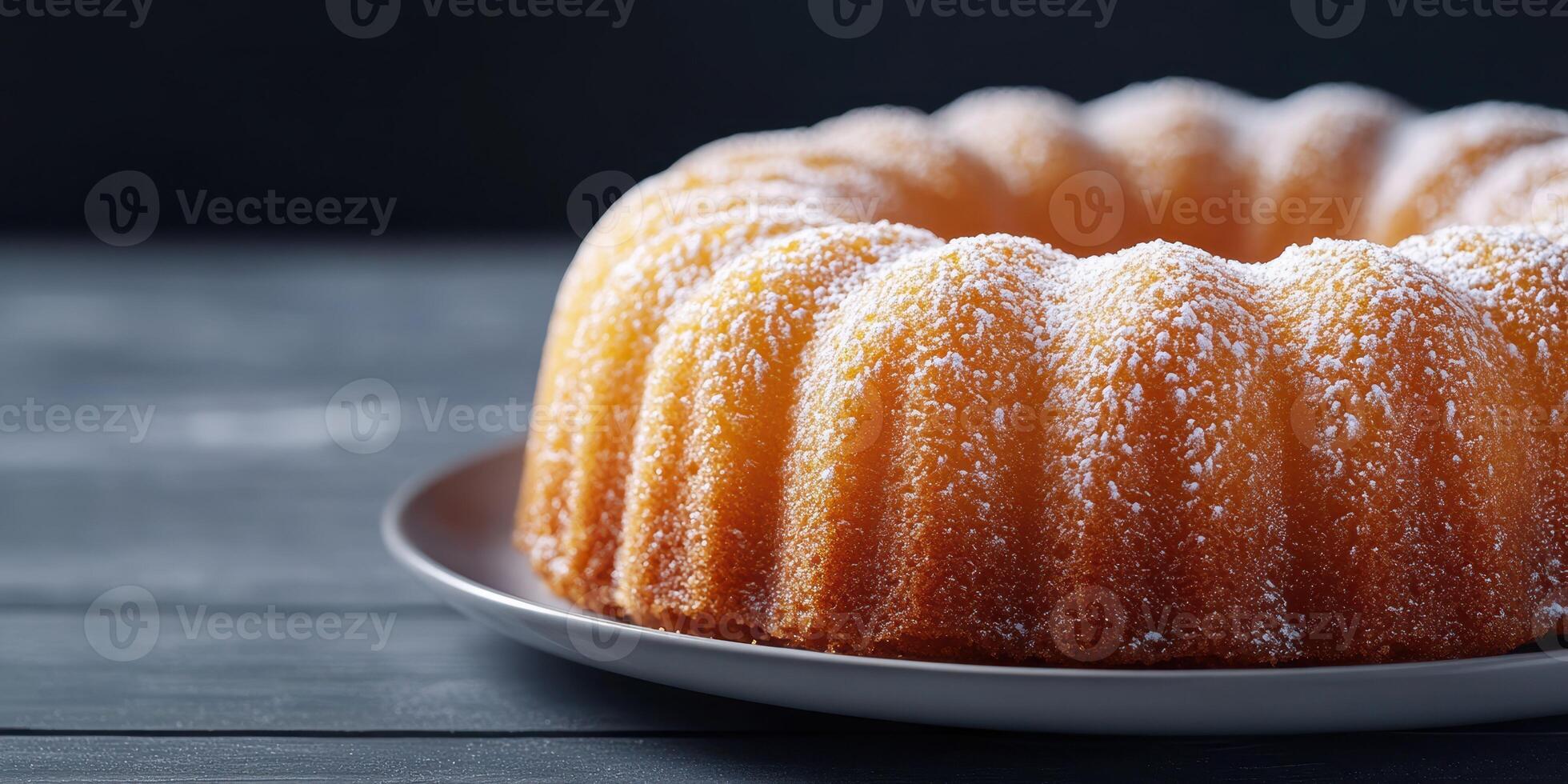 Delicious bundt cake displayed on a plate ready for serving at a cozy gathering photo