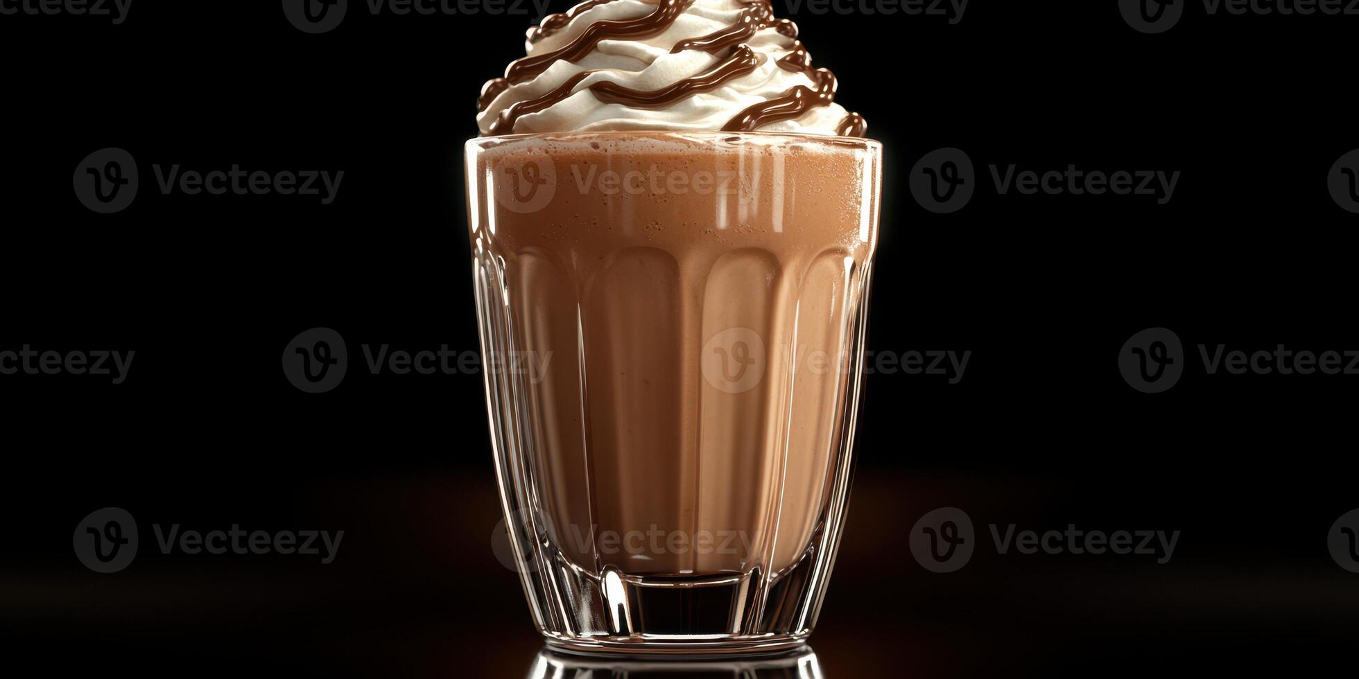 Delicious chocolate milkshake topped with whipped cream and chocolate drizzle served in a clear glass photo
