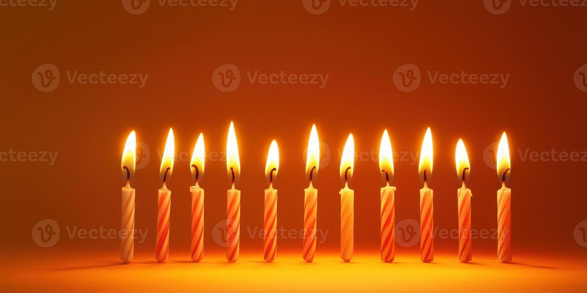 Colorful candles illuminated with vibrant flames creating a warm atmosphere during a celebratory event photo
