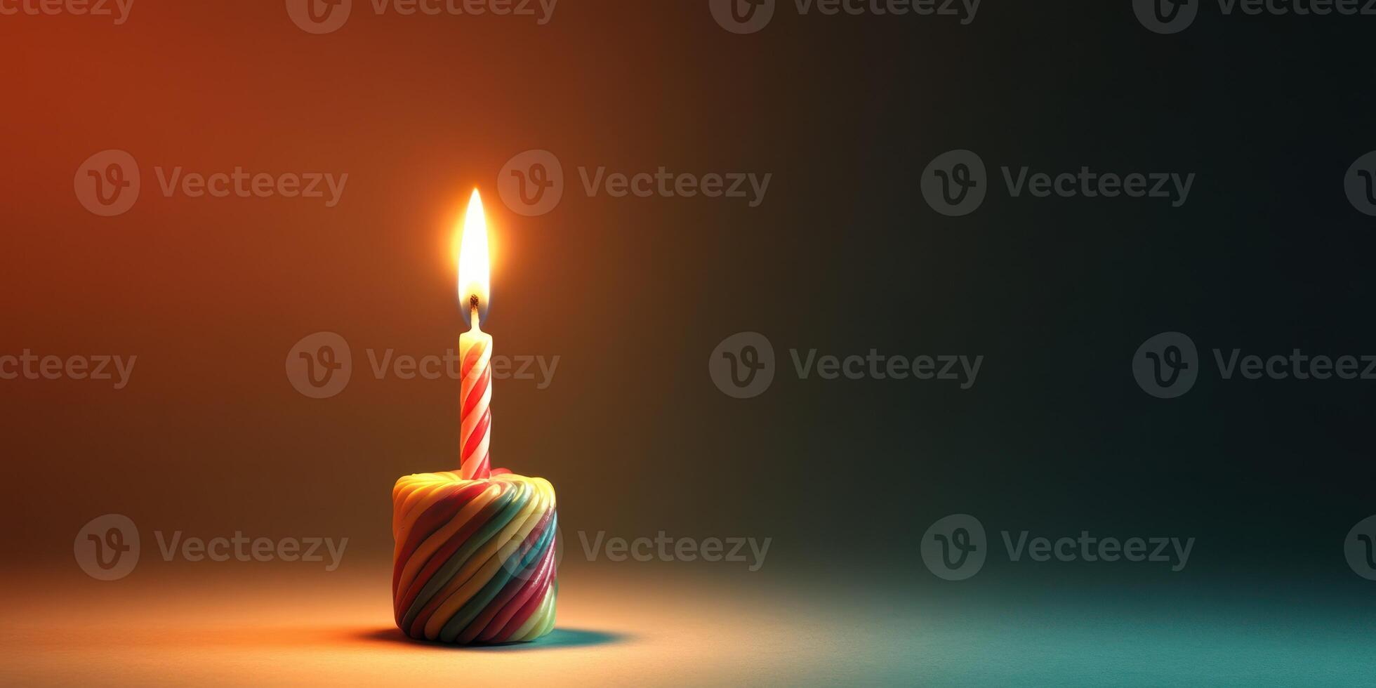Candle burns brightly in a dimly lit setting creating a warm atmosphere and soft shadows photo