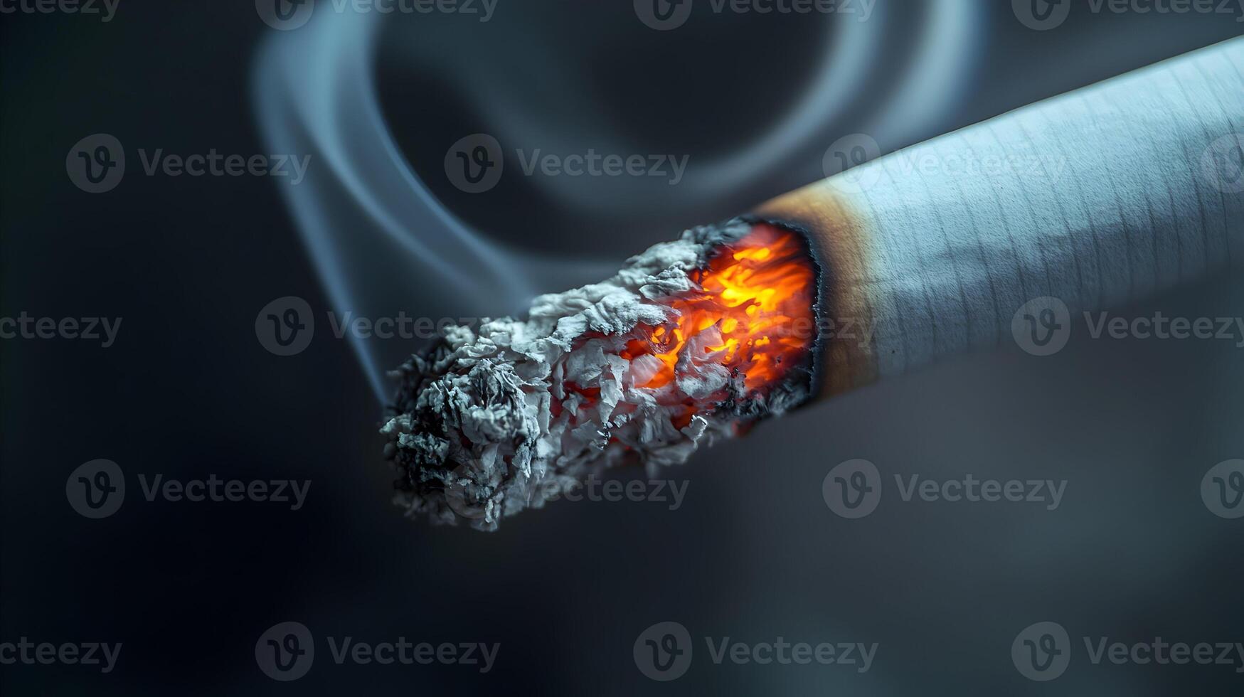 Close-up of a Lit Cigarette with Glowing Tip and Rising Smoke Against a Dark Backdrop photo