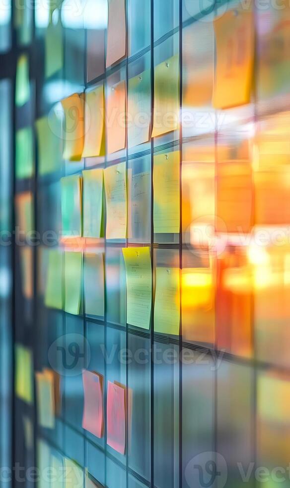 Inspiring creative brainstorm of ideas pinned to clear glass wall, visual representation photo