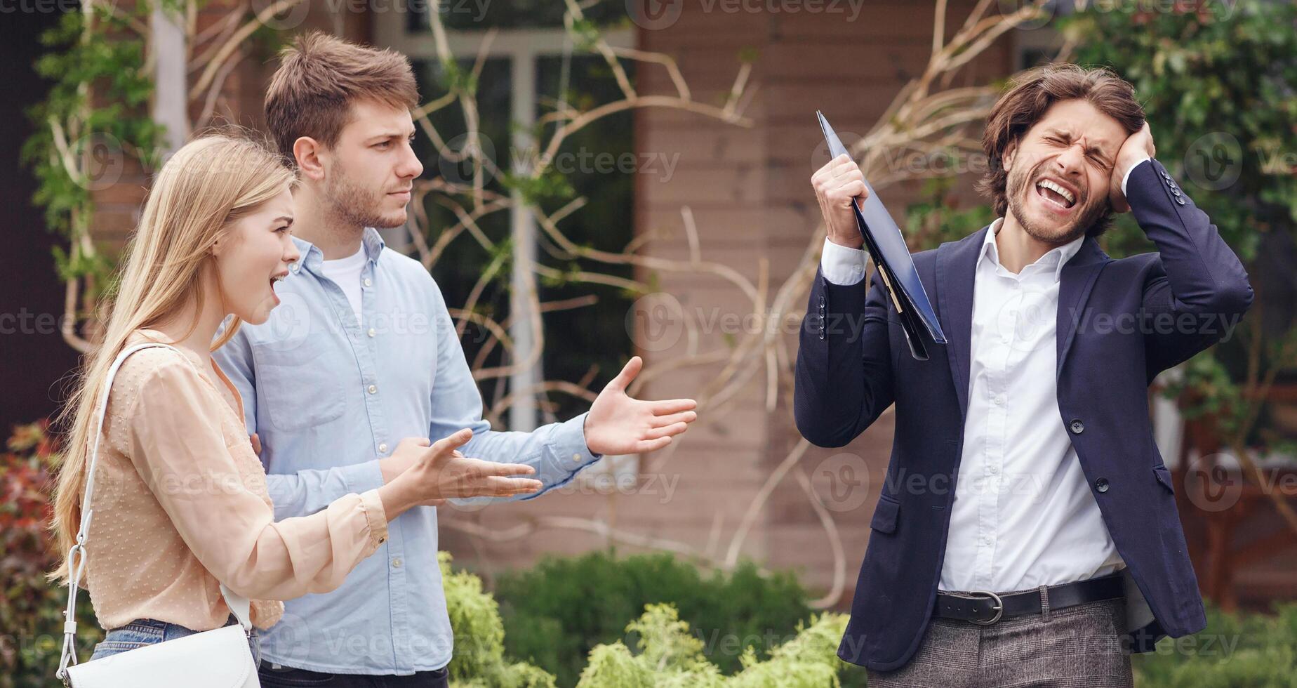 Annoyed clients arguing with irritated real estate agent about property purchase, outside photo