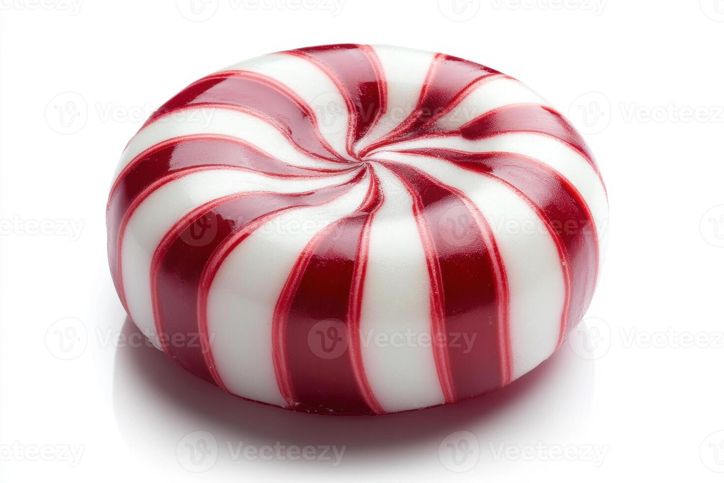 Classic red and white peppermint candy with spiral design photo