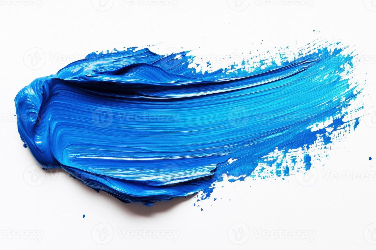 Vibrant blue paint smeared on a white canvas creating texture photo