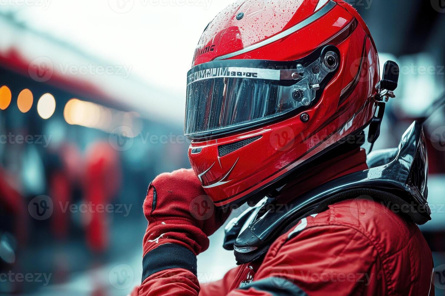 Race car driver prepares in rainy weather before the competition photo