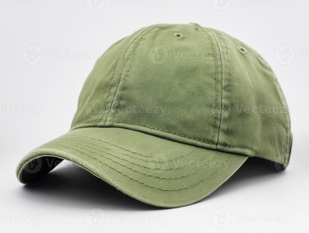Green cap displayed on a plain background in studio lighting photo