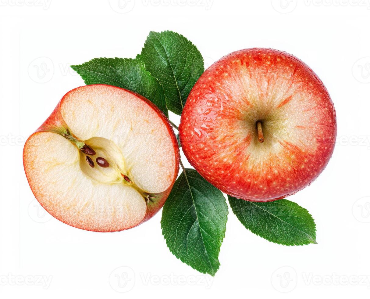 Fresh red apple with green leaves sliced in half on a white background photo
