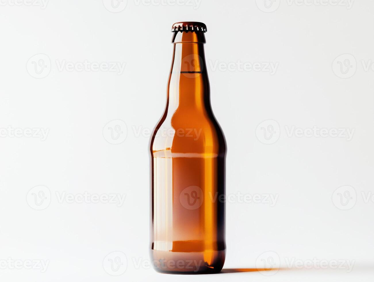 Empty amber glass bottle of beer displayed against a light background photo