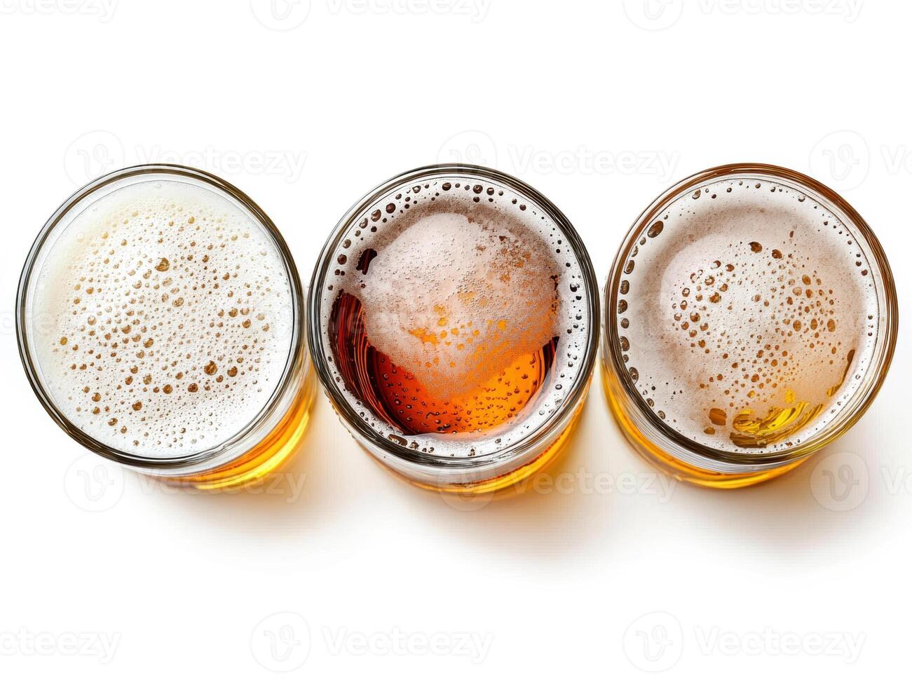 Variety of beers displayed in glass mugs with frothy tops photo