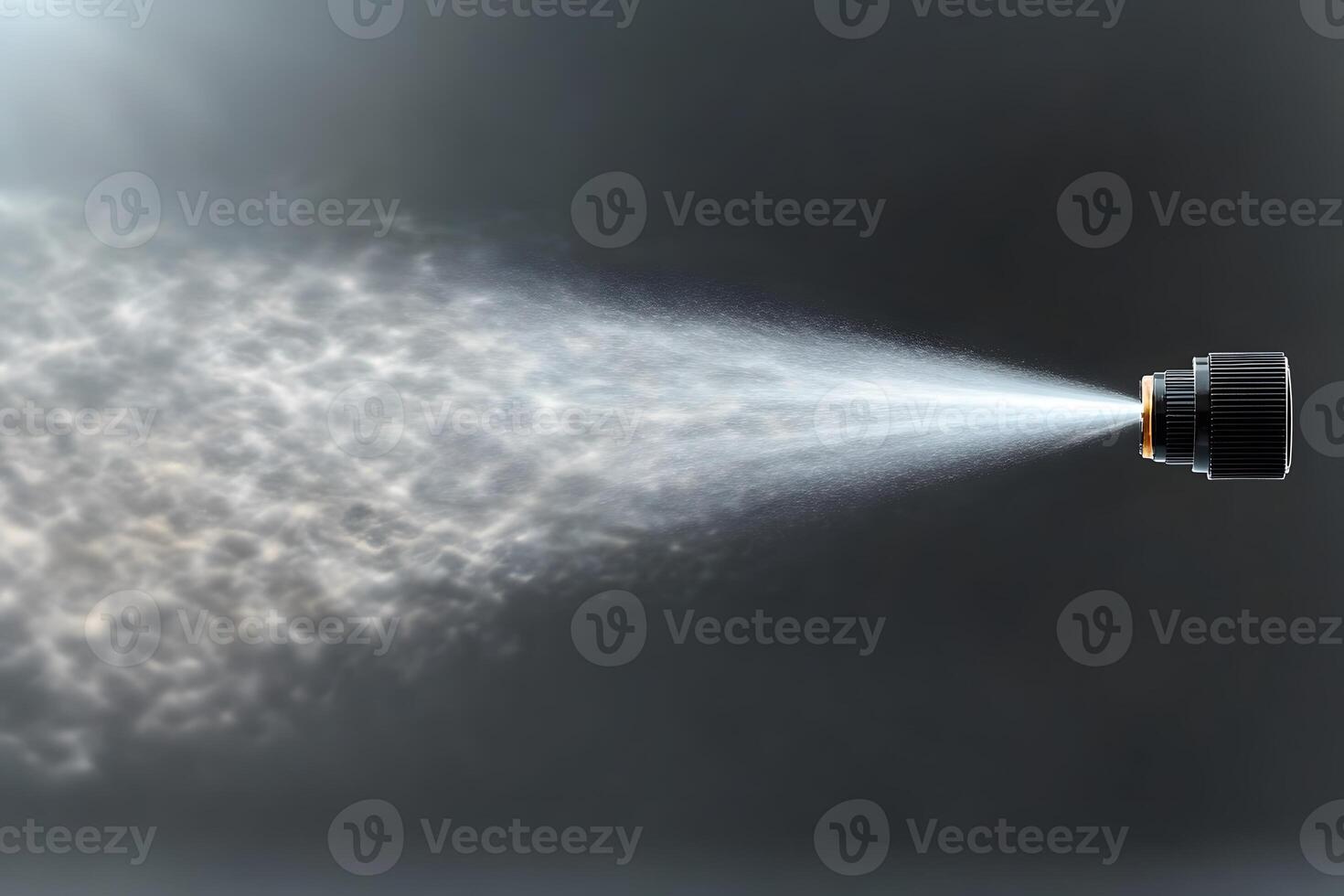 Close-Up of Spray Bottle Nozzle Releasing Mist for Cleaning or Refreshing photo