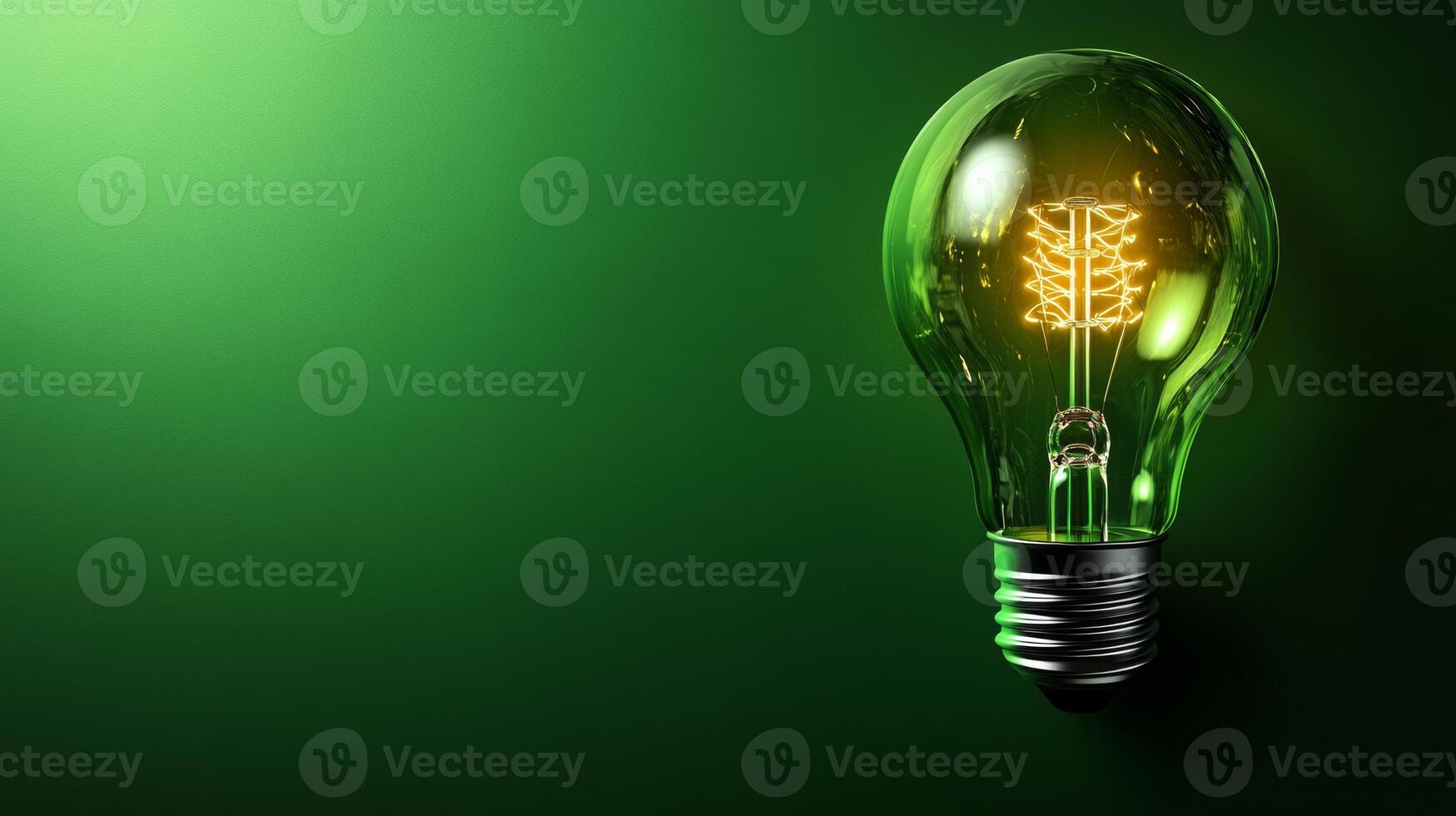 A green light bulb with a green stem inside photo