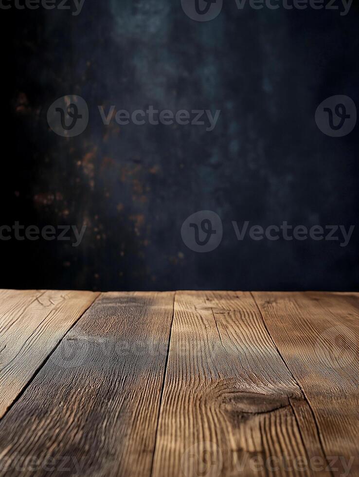 Close-up of wooden table with side light on dark textured wall photo