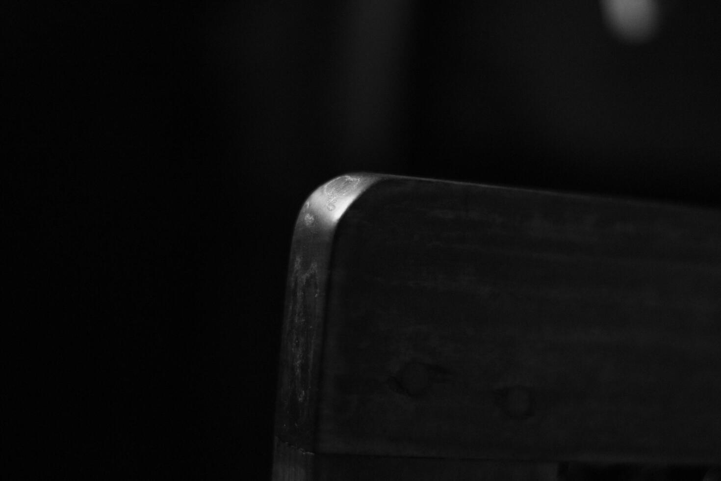 A black and white photo of a black and white chair