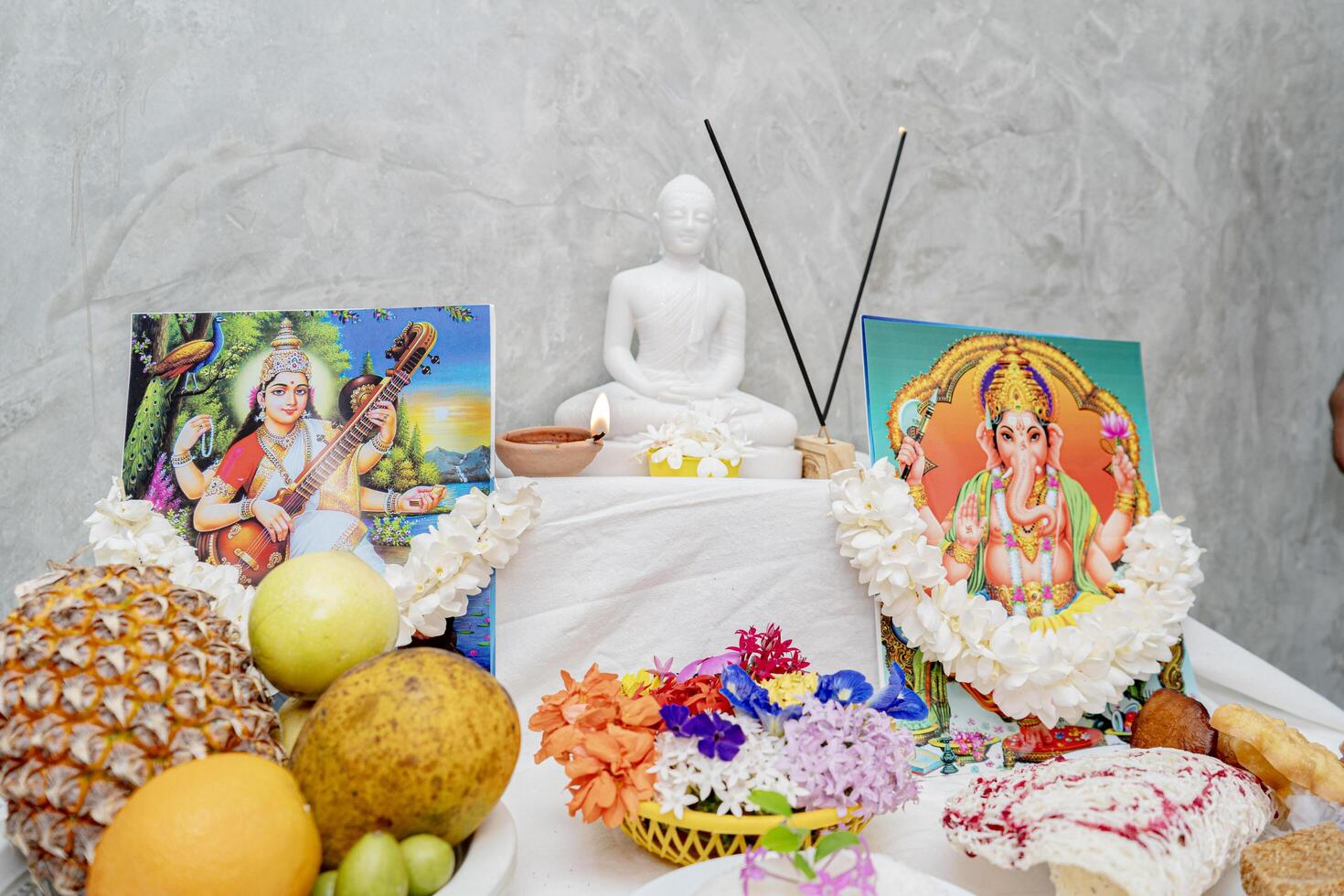 A table with fruit and flowers on it photo