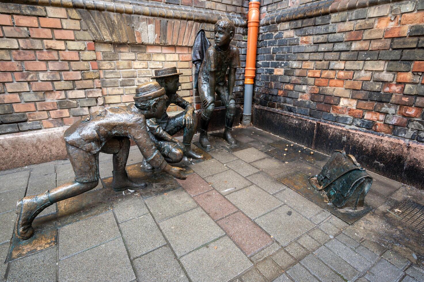 Budapest, Hungary, August 29, 2022. Street view with the representation with metal statues of a moment of play of the boys of Pal street, a famous book photo