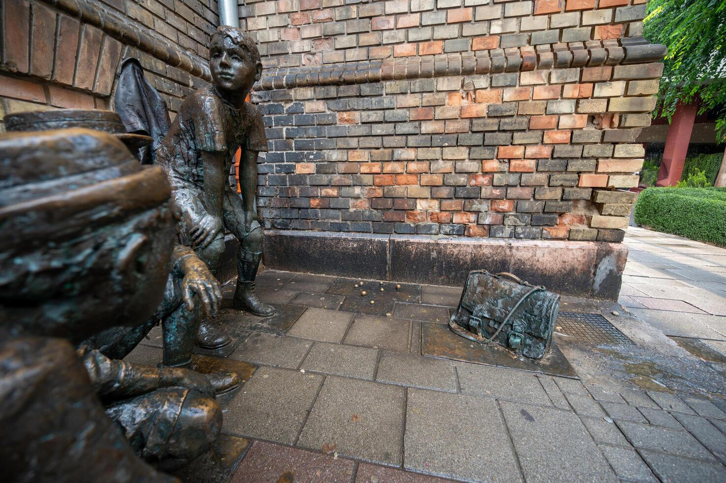 Budapest, Hungary, August 29, 2022. View with the representation with metal statues of a moment of play of the boys of Pal street, a famous book for young people. photo