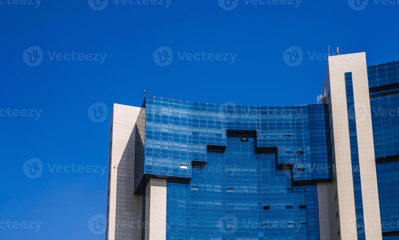 a fragment of the facade of a modern futuristic building photo