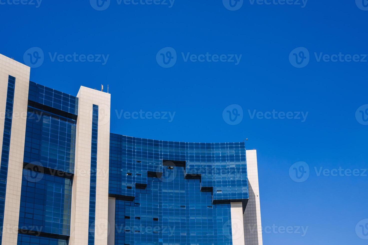 a fragment of the facade of a modern futuristic building photo