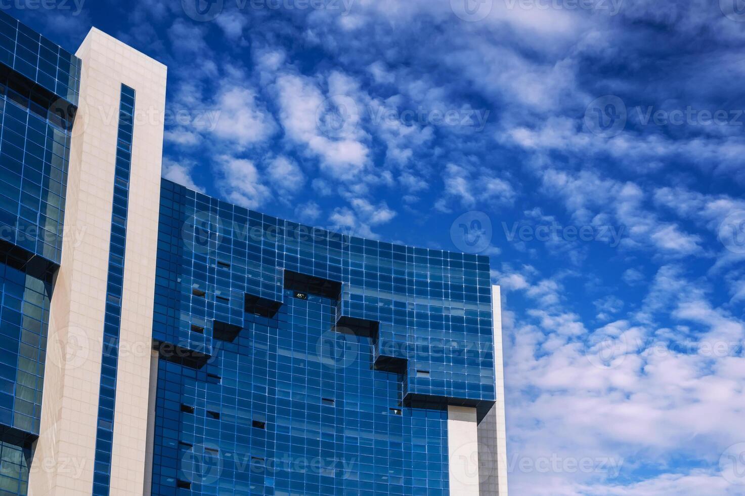 a fragment of the facade of a modern futuristic building photo
