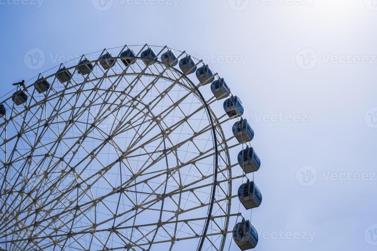 white big Ferris wheel on background a sky in amusement park photo