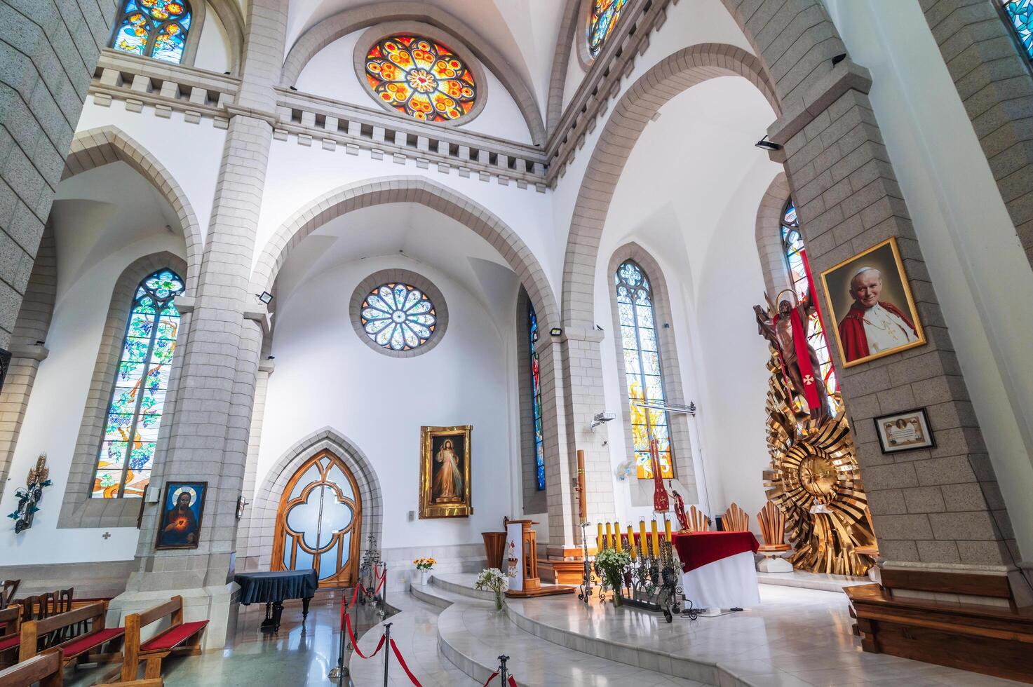 Interior of Catholic church. Sacred Heart of Jesus Cathedral. Tashkent, Uzbekistan - April 18, 2024 photo