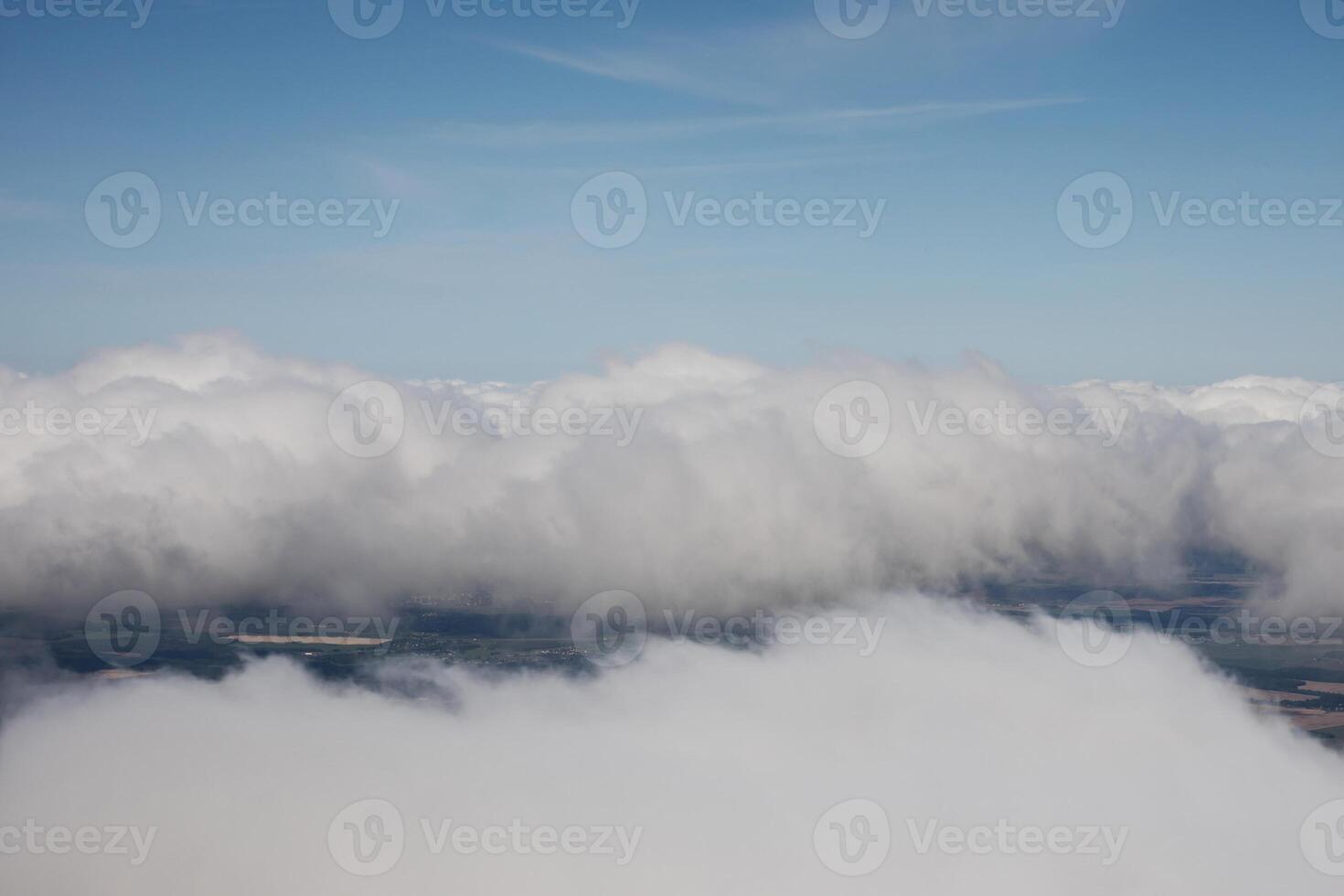 sky and fluffy white clouds photo