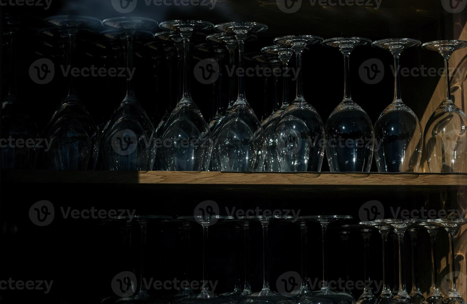 empty inverted wine or champagne glasses photo
