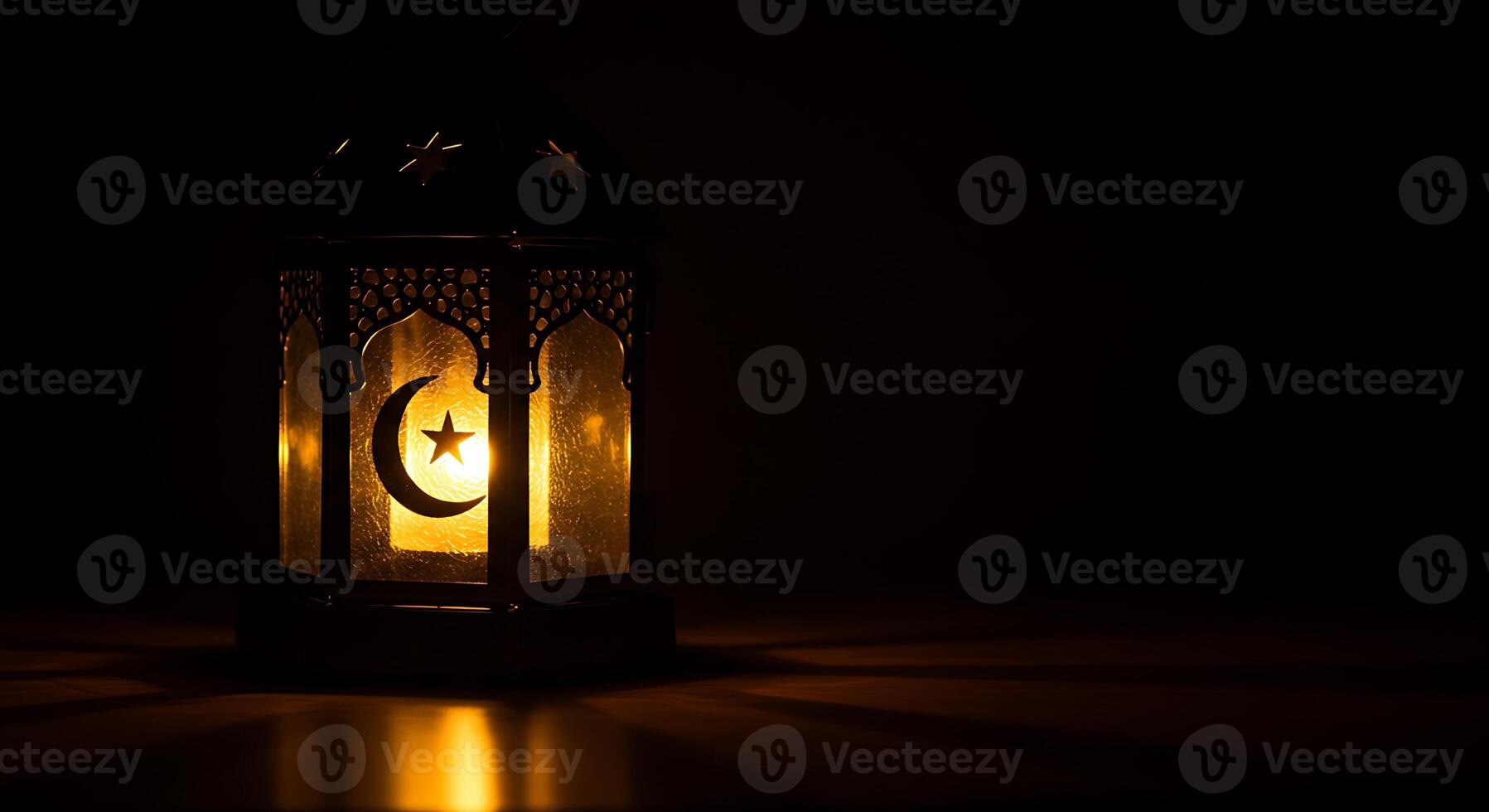 A lantern with a crescent and star on it photo