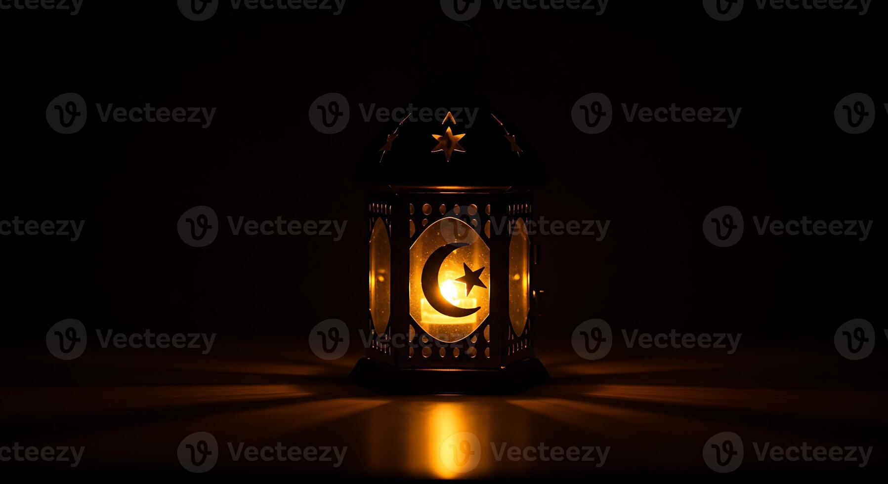 A lantern with a crescent moon on it photo