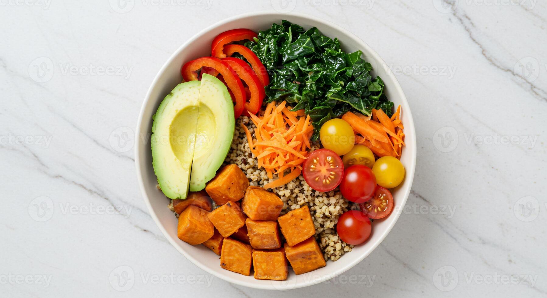 A bowl of vegetables and meat with avocado photo