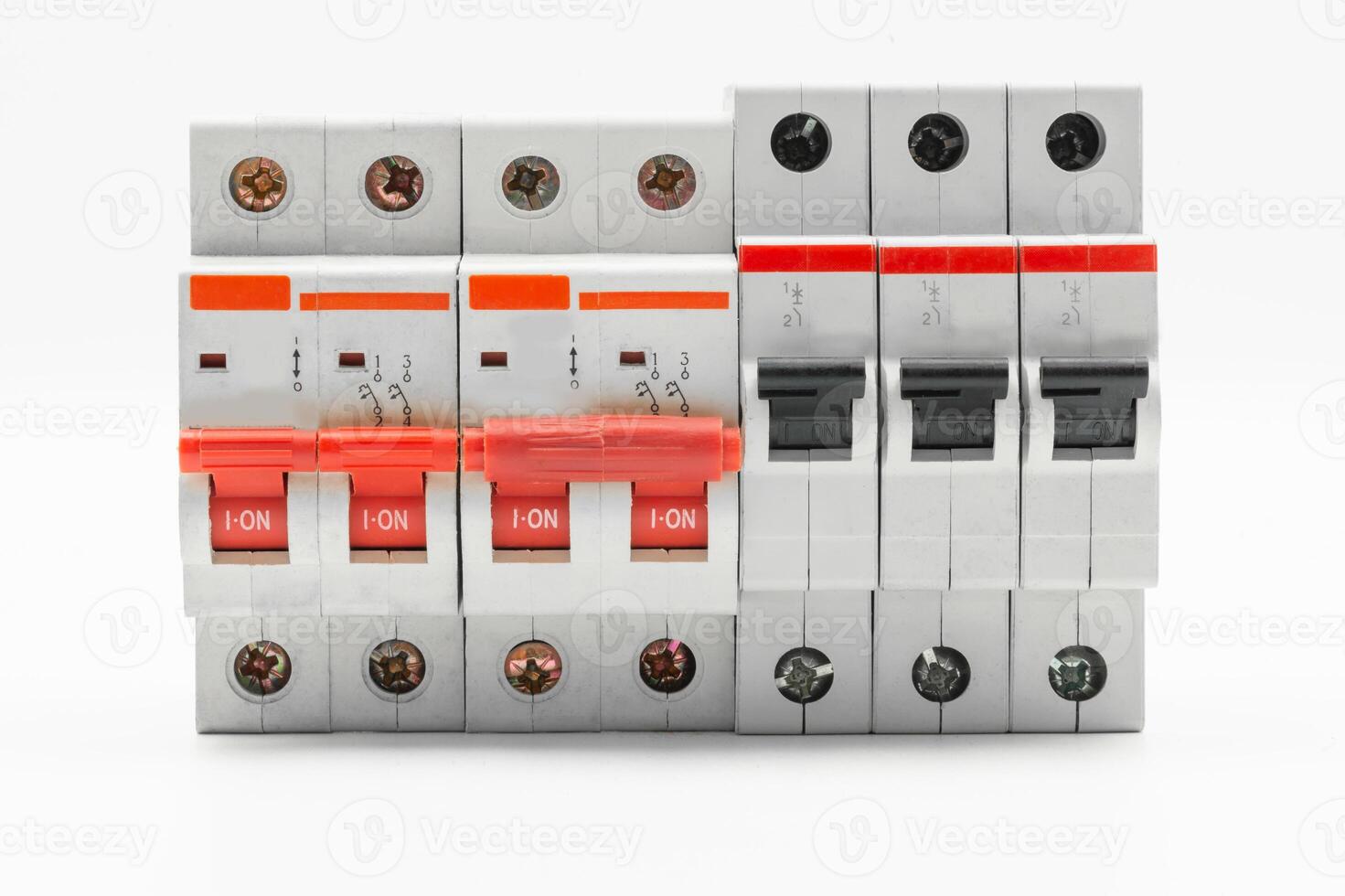 Electric circuit breakers with indicators in the on position in a panel setup photo