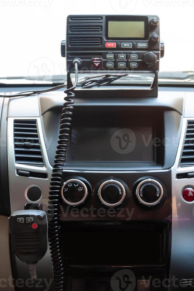 Trunk radio setup in car for enhanced communication during travels and outdoor activities photo