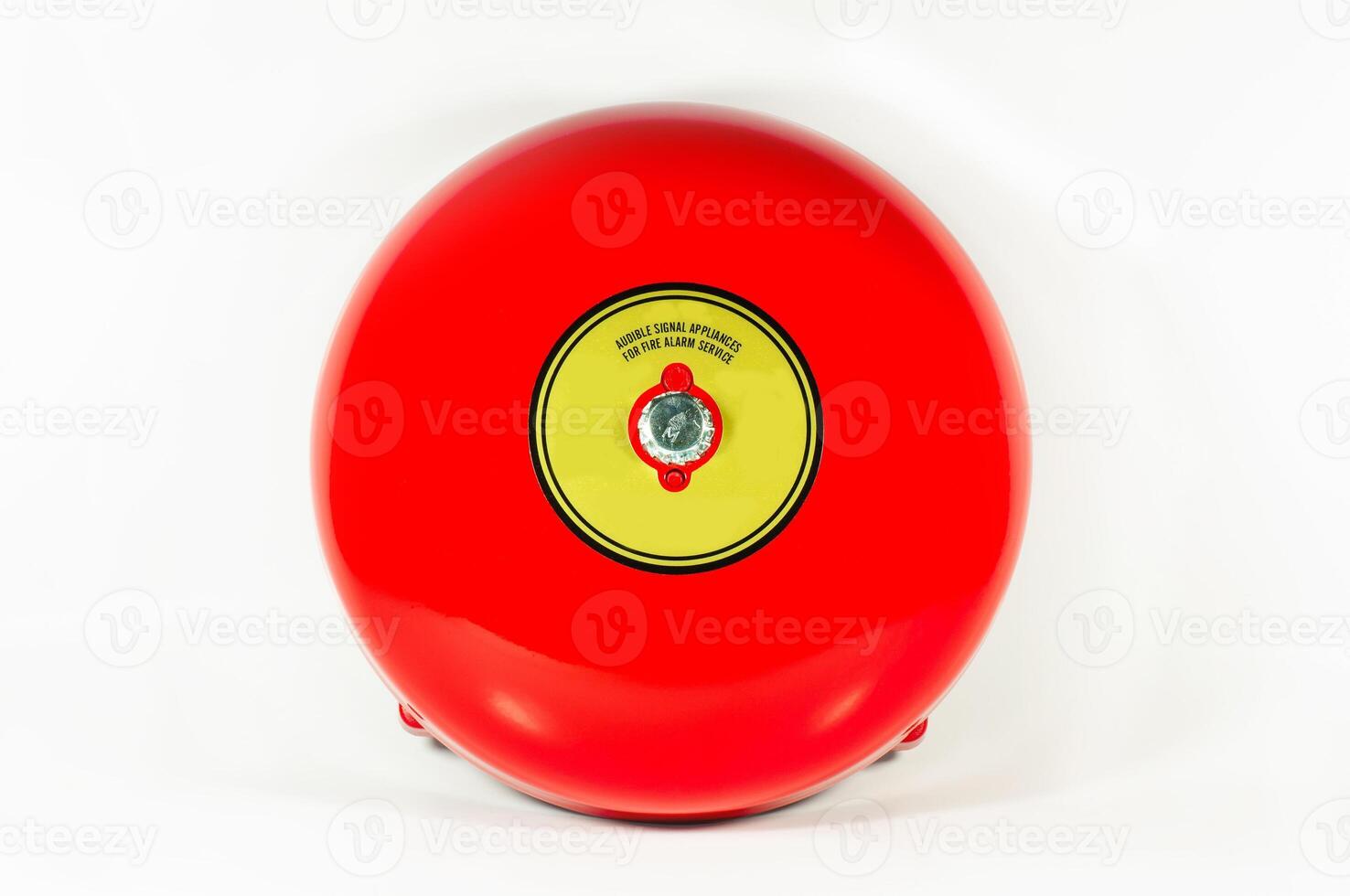 Audible alarm bell with a vibrant red exterior for alert systems in various settings photo