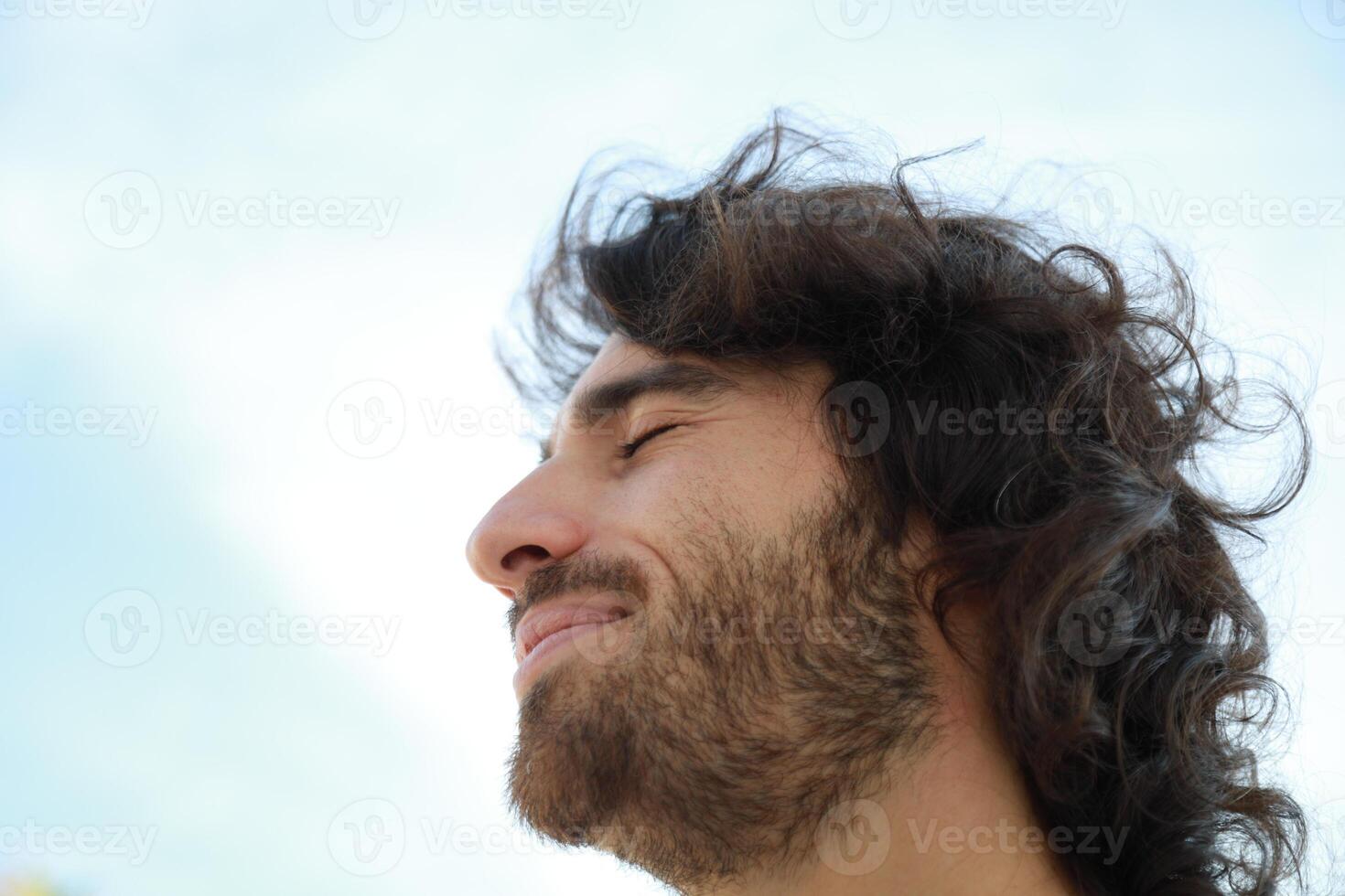 Sad Man In His Life Looks Into The Void And Makes A Slight Smile photo