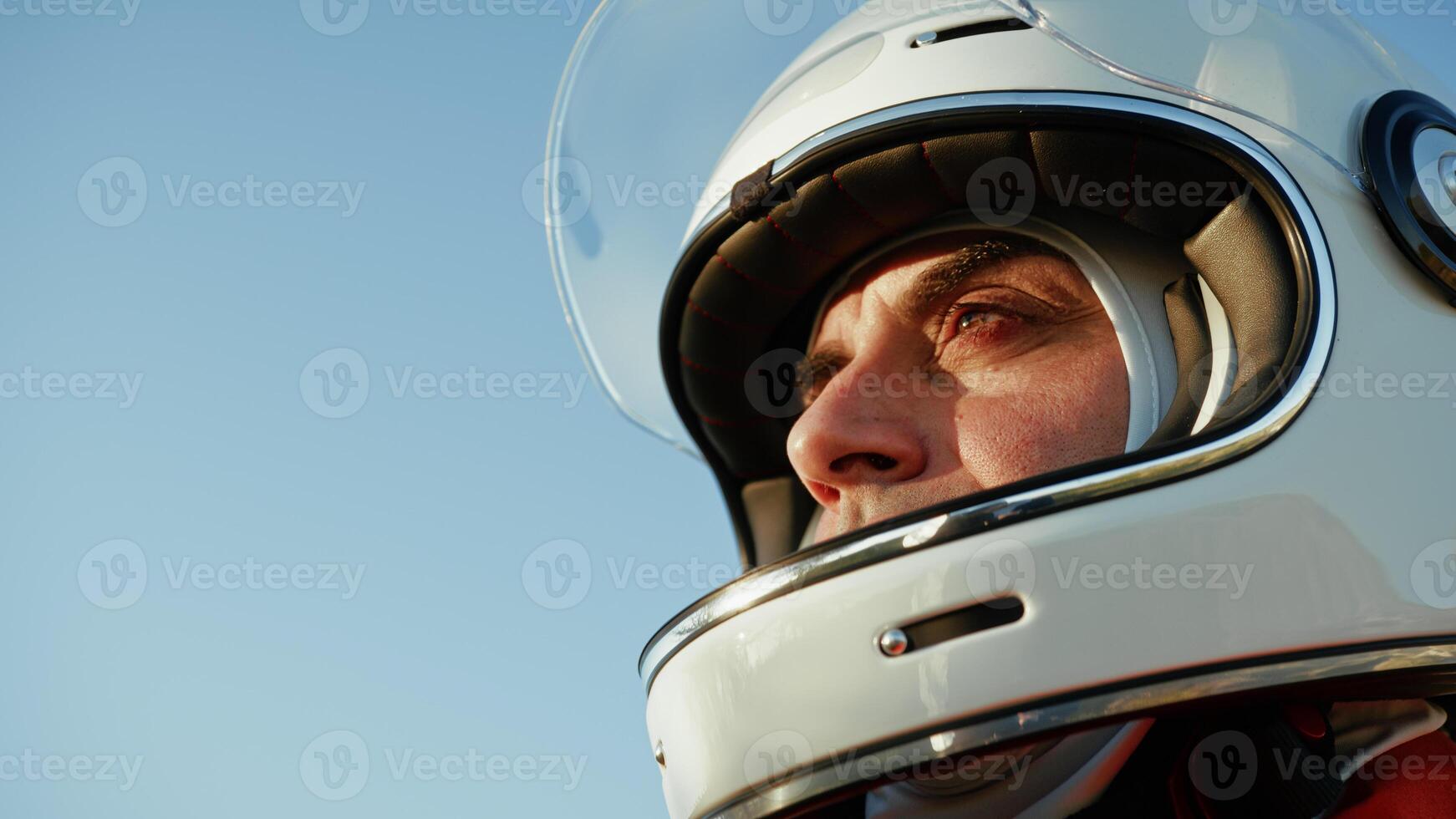 Astronaut Lowers His Helmet Visor And Prepares To Walk Into The Wasteland photo