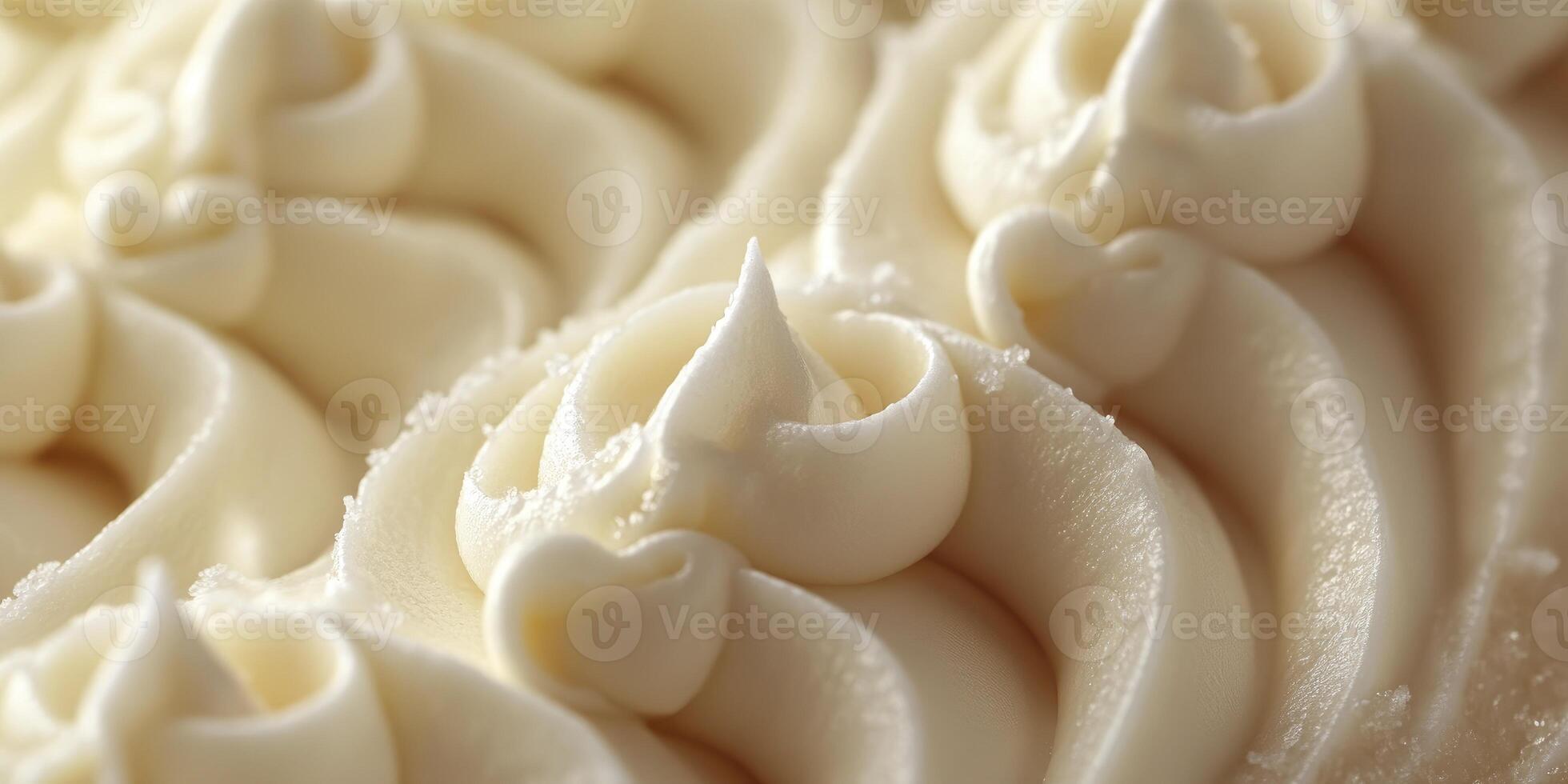 Close up of white frosting on a cake photo