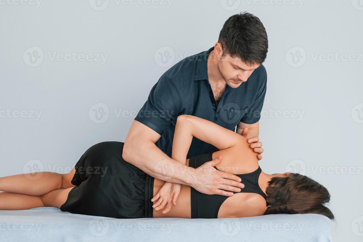 On the table. Woman visiting physiologist that making massages and helping with traumas.. photo