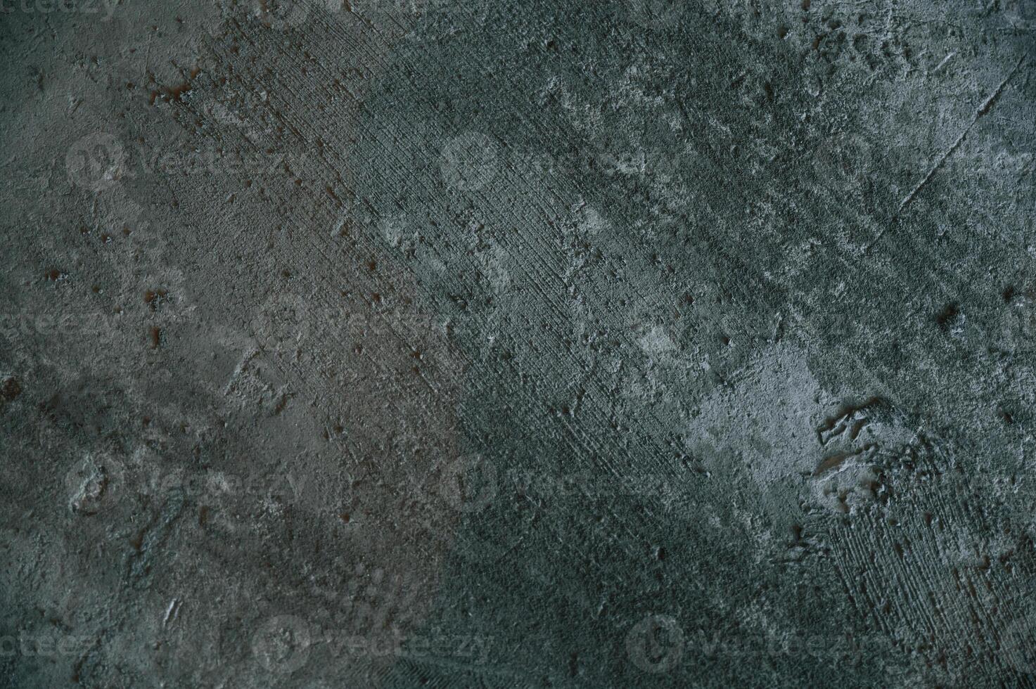 Background of dirty concrete floor with footsteps and lines on it photo
