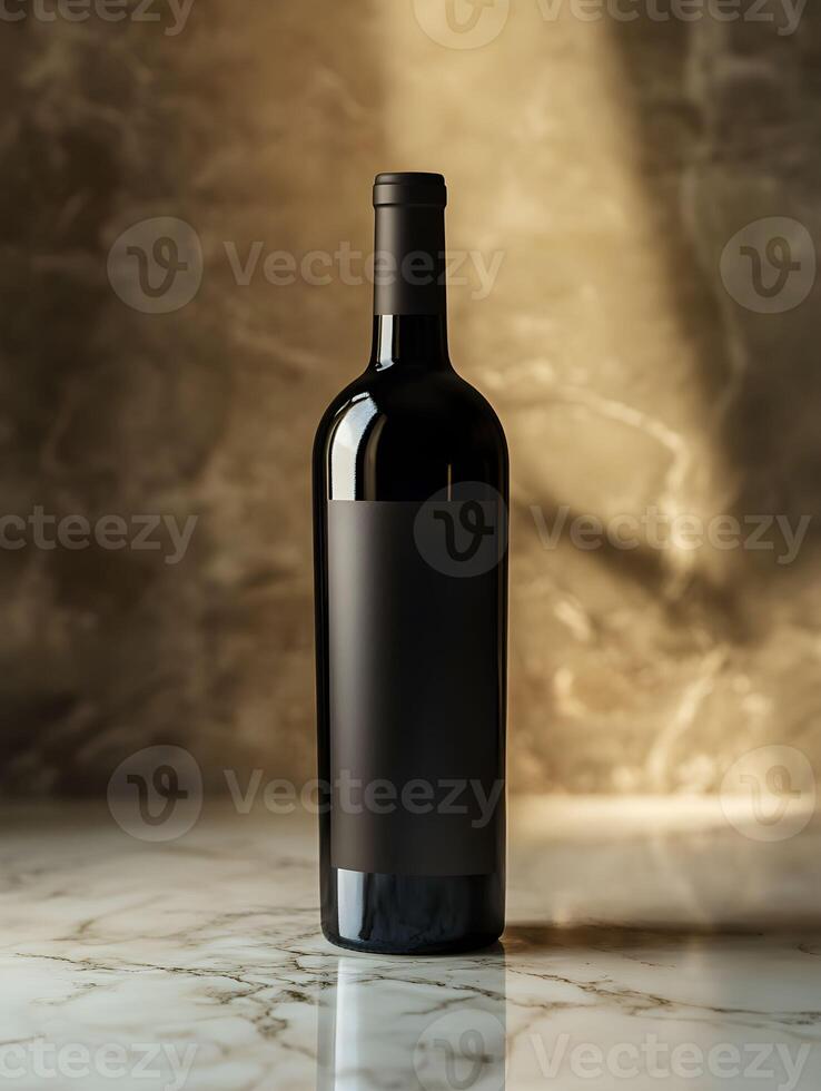 A bottle of wine sitting on a table photo