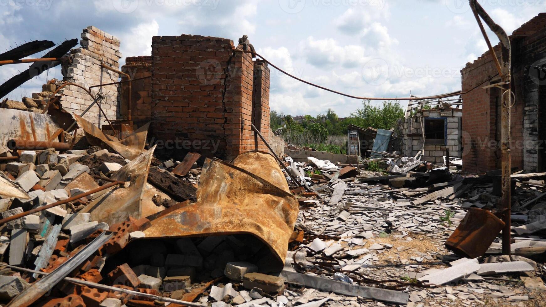 View to destroyed residential buildings at Kharkivska oblast. Ruined houses after bomb attacks on ukrainian territory from russia army. Consequences of russian invasion of Ukraine. Slow motion photo