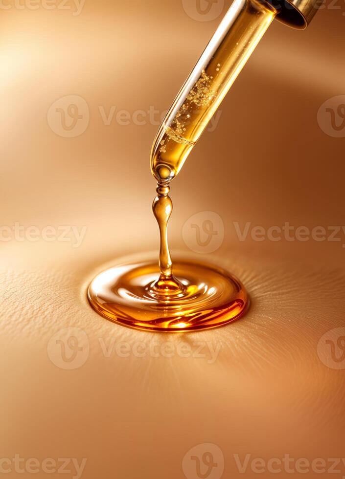 Pipette with a drop of essential oil on a brown background. Golden Serum Dropper photo