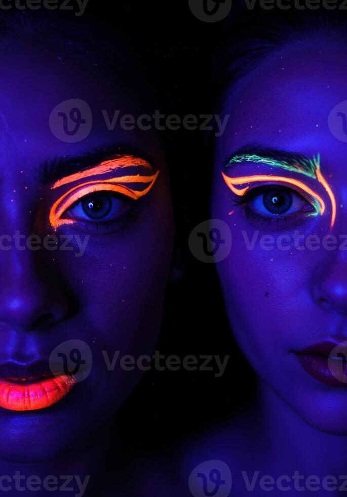 Fashion art portrait of beautiful young woman with neon make up. Neon Glow Makeup Art photo