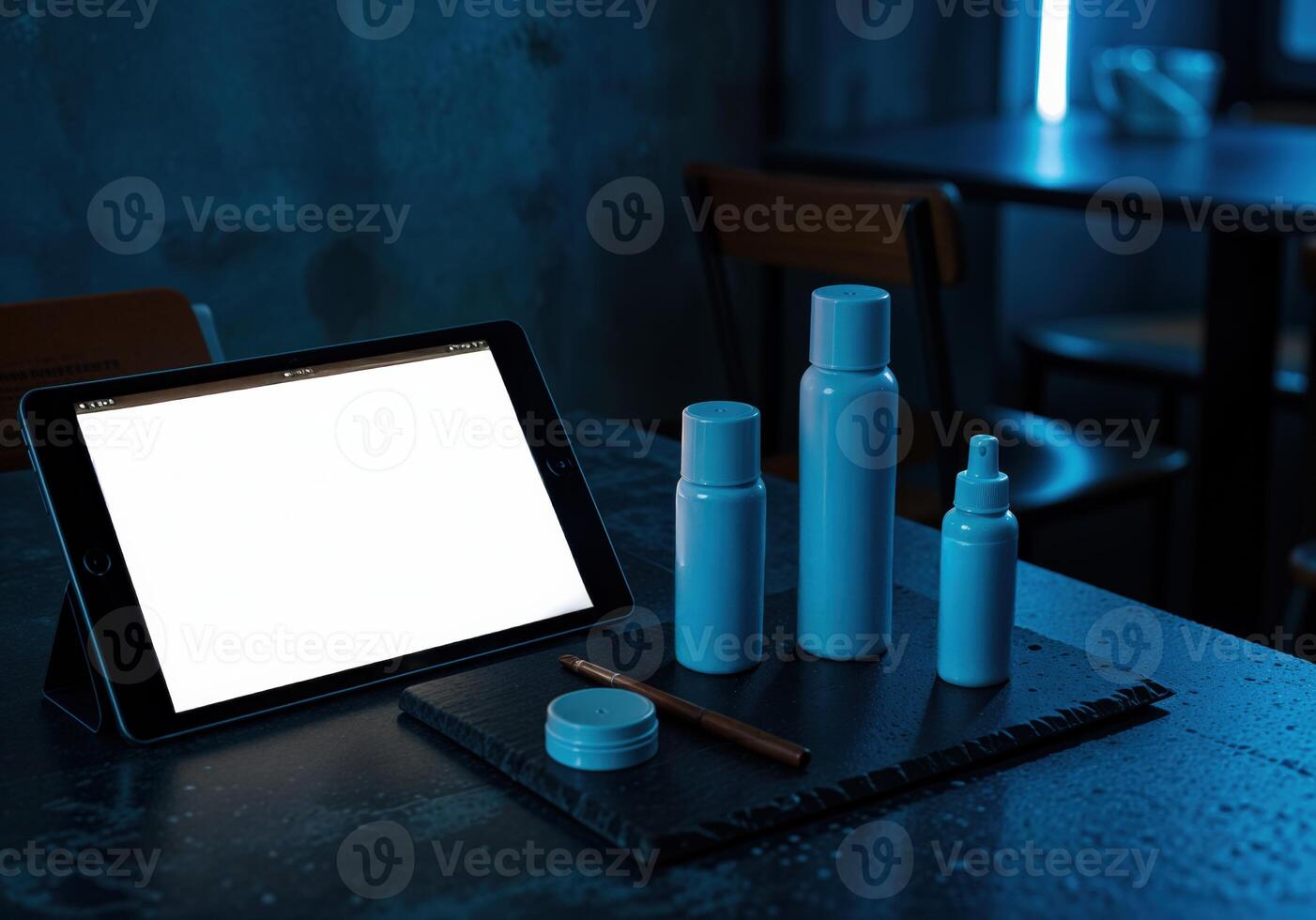 Mockup image of tablet pc with blank white screen and cosmetics on table. Beauty Product Mockup photo