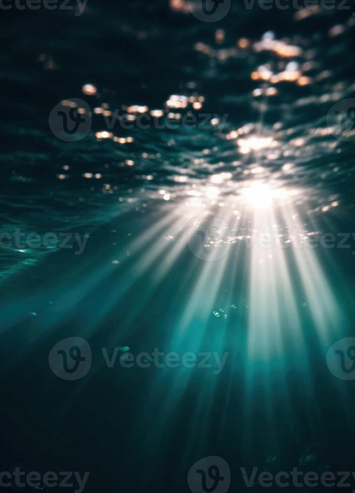 underwater light beams shining through the water. Sunbeams Underwater photo