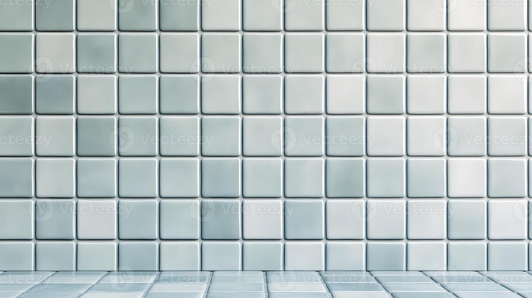 A clean tiled wall with square tiles arranged in a grid pattern. photo