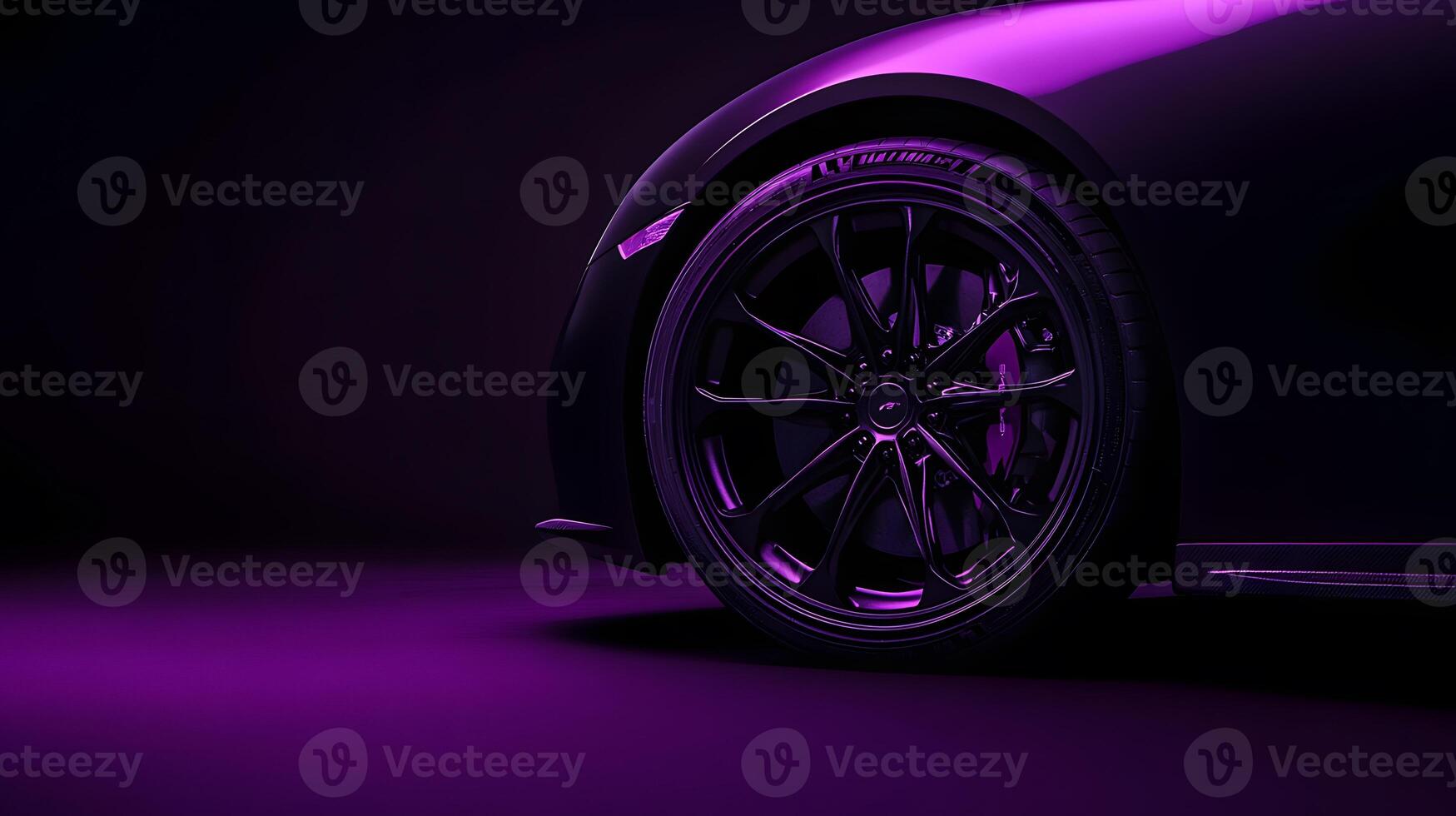 Black Sports Car Wheel and Body Detail photo