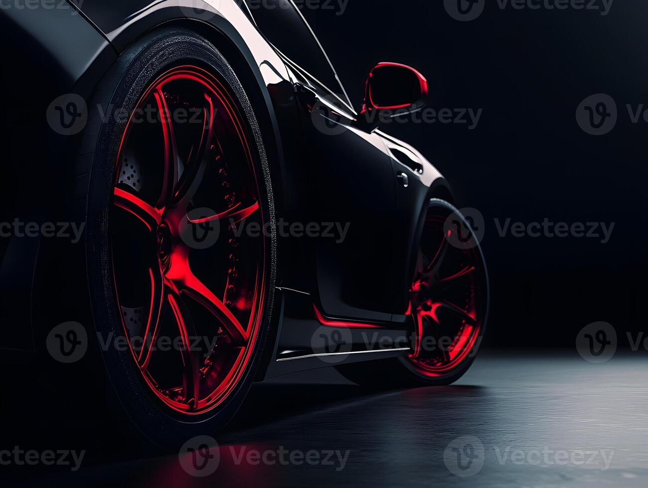 Black Sports Car with Red Alloy Wheels photo